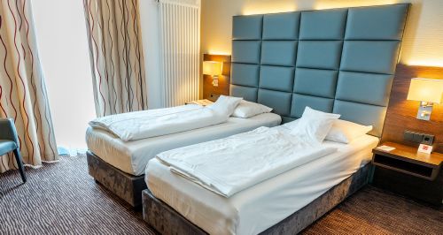 Hotel Motive, Zimmer, Doppelzimmer, Bett Doppelzimmer