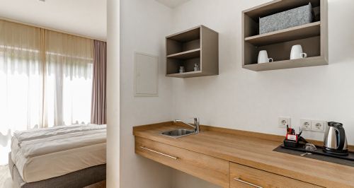 Hotel Motive, Zimmer, Küche/Kitchenette, Kitchenette Komfort-Plus-Juniorsuite