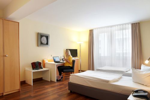 Hotel Motive, Zimmer, Twin-Zimmer, Zimmer mit getrennten Betten